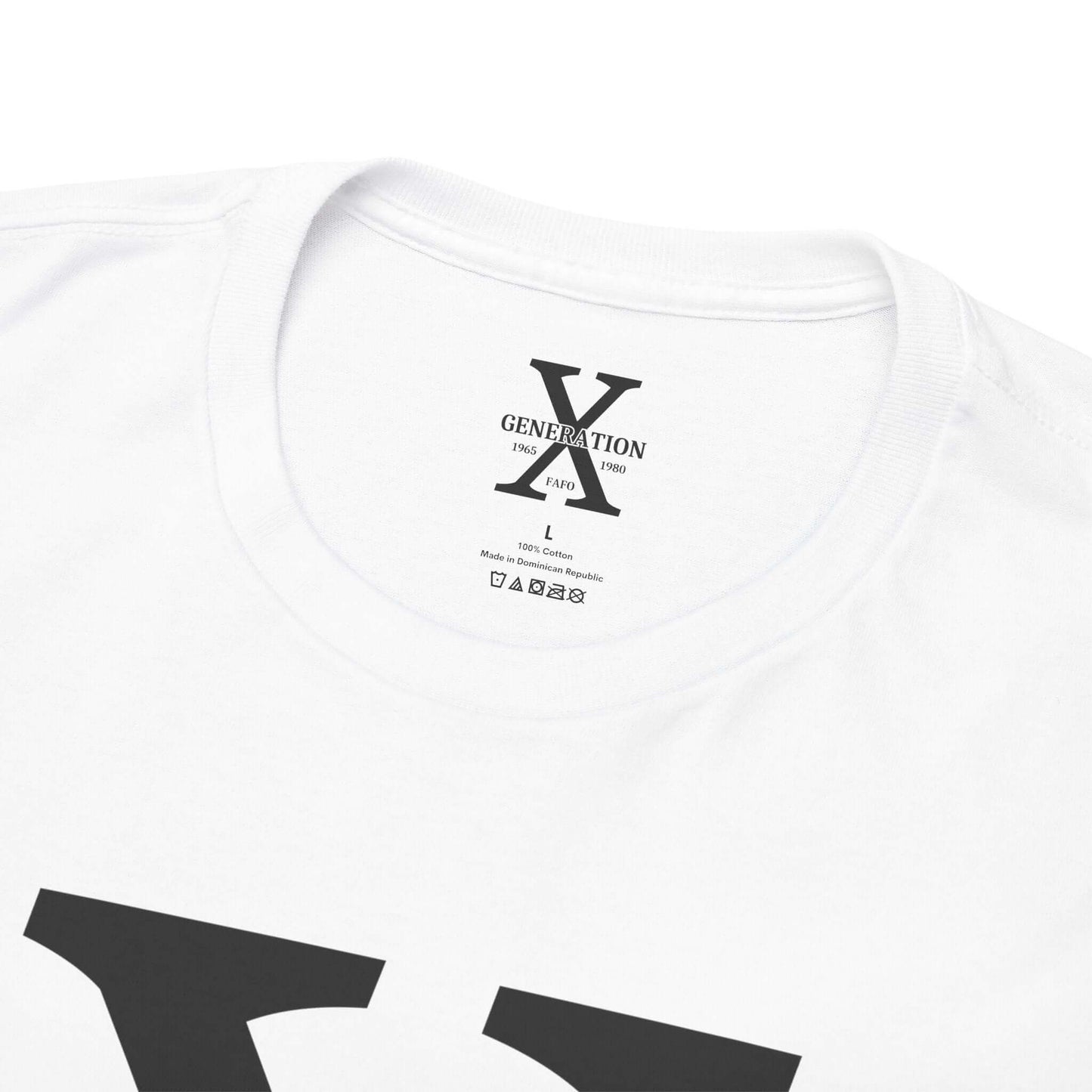 A white t-shirt with a large white “X” on the front, representing Generation X. The inside collar features a printed label with the same “Generation X” design, size details, and care instructions.