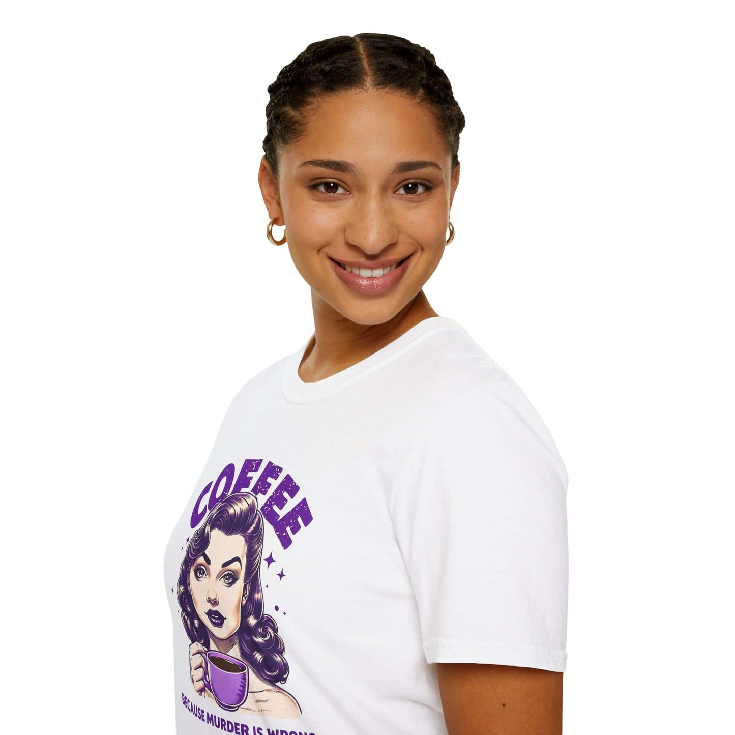 Smiling woman wearing a white unisex t-shirt with a retro ‘Coffee - Because Murder Is Wrong’ design in purple, featuring a vintage-style woman holding a coffee cup.