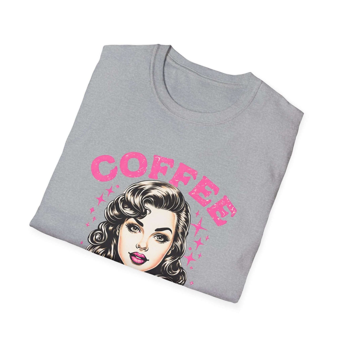Folded gray unisex t-shirt featuring a retro ‘Coffee - Because Murder Is Wrong’ design in pink, with a vintage-style woman holding a coffee cup illustration.