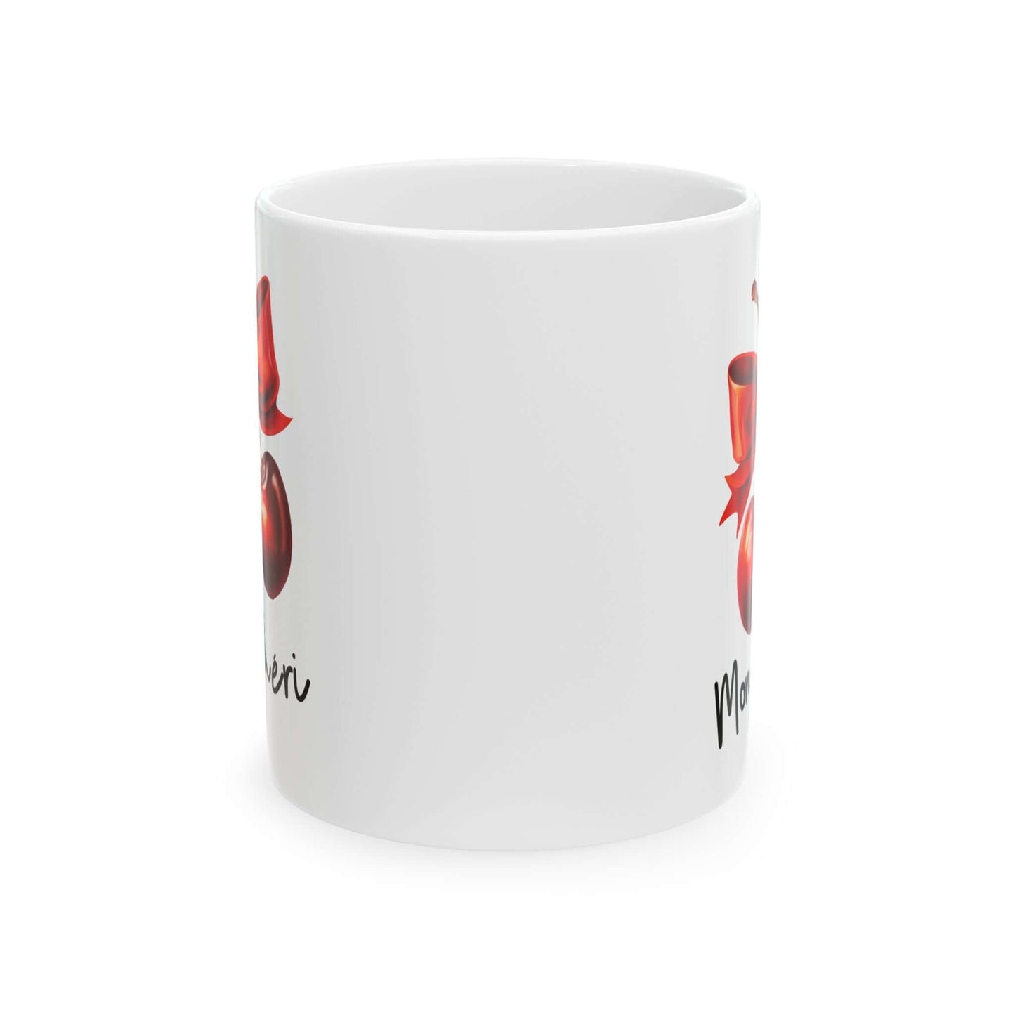 front view of a white ceramic mug, featuring two red cherries with a red bow and the text ‘Mon Chéri