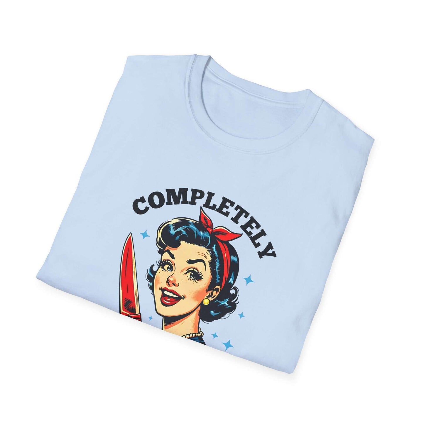 Folded light blue unisex t-shirt featuring a retro ‘Completely Unhinged’ design with a vintage-style woman holding a red knife and bold text.