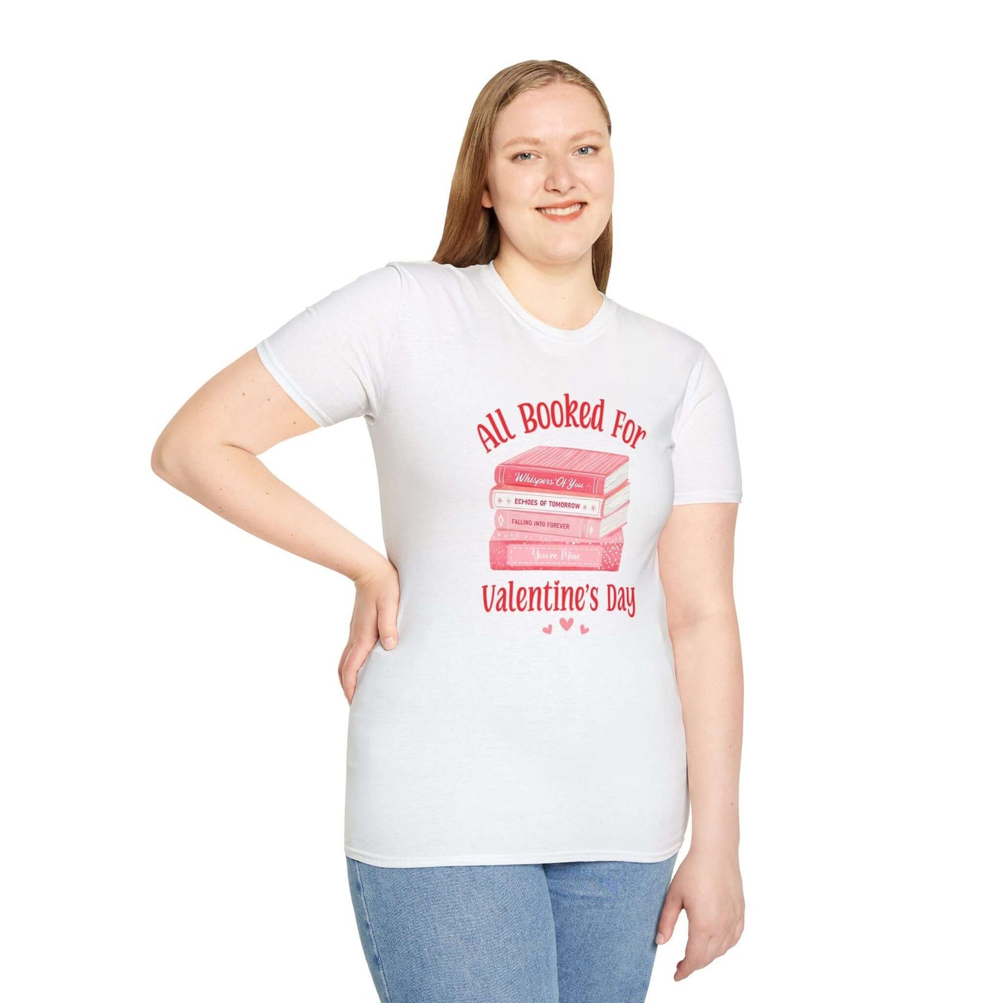 Woman wearing white t-shirt featuring the text ‘All Booked for Valentine’s Day’ with a graphic of stacked red and pink books.