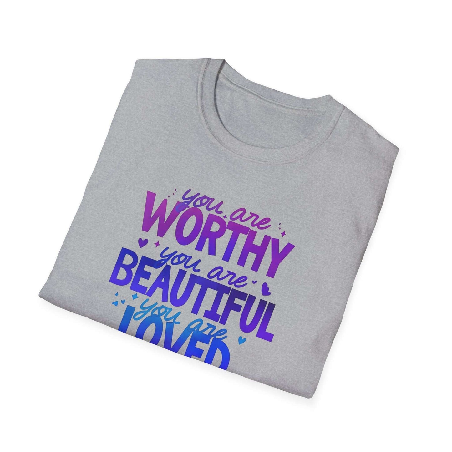 Gray folded t-shirt featuring the text ‘You are Worthy, You are Beautiful, You are Loved, You are Enough’ in purple and blue font.
