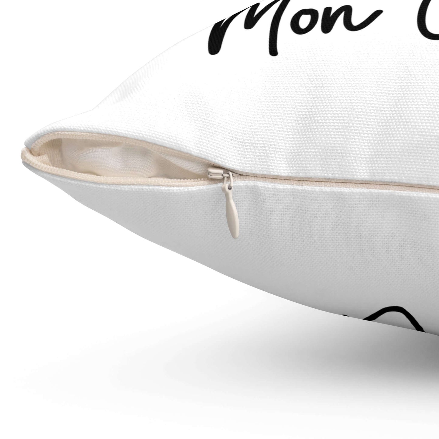 Zipper view of a white throw pillow featuring a vibrant ‘Mon Chéri’ design with two red cherries tied with a bow and elegant text.