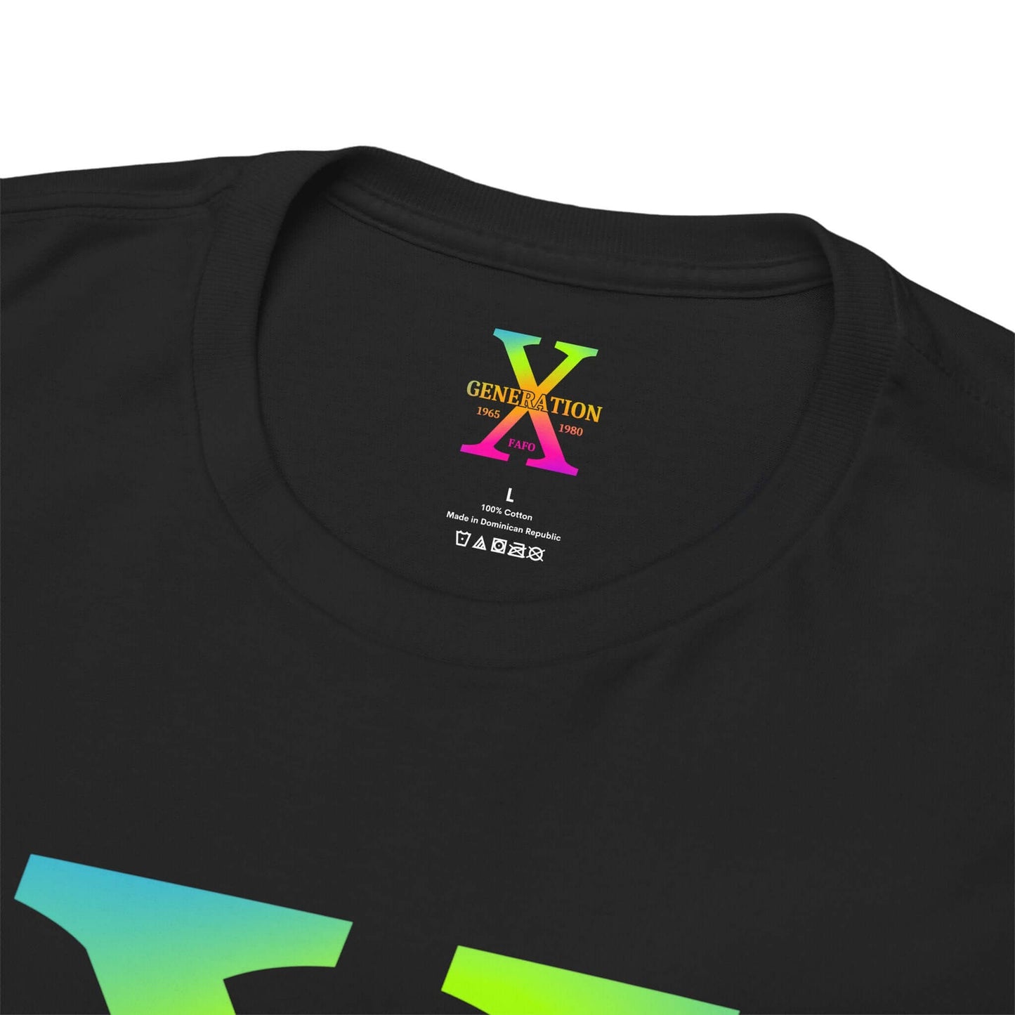 A black t-shirt with a large rainbow gradient “X” on the front, representing Generation X. The inside collar features a printed label with the same “Generation X” design, size details, and care instructions.