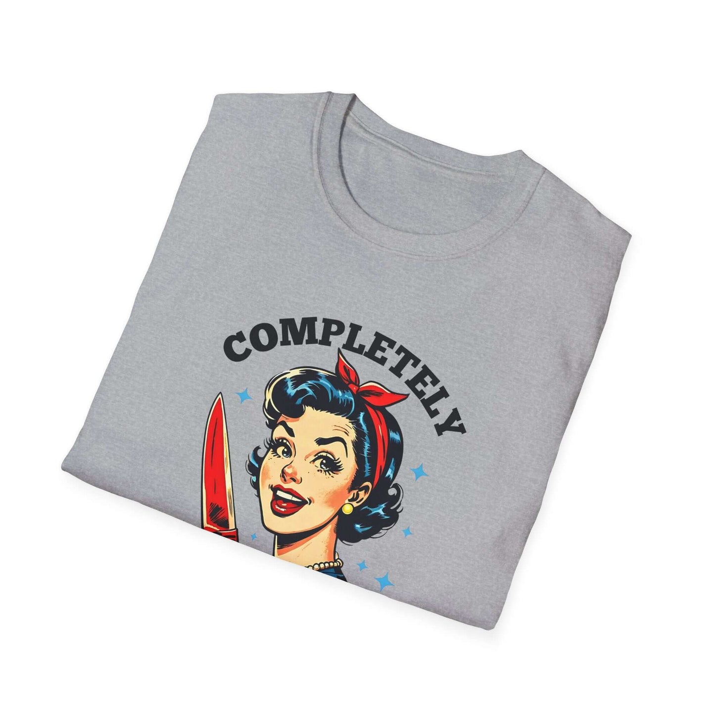 Folded gray unisex t-shirt featuring a retro ‘Completely Unhinged’ design with a vintage-style woman holding a red knife and bold text.