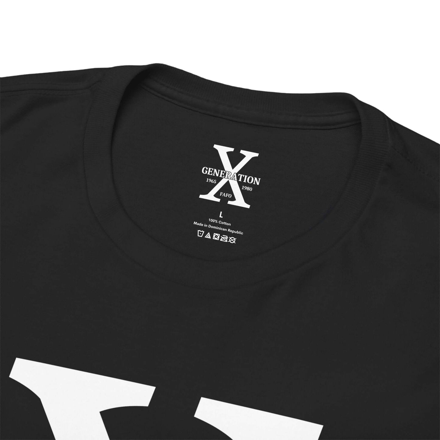 A black t-shirt with a large white “X” on the front, representing Generation X. The inside collar features a printed label with the same “Generation X” design, size details, and care instructions.