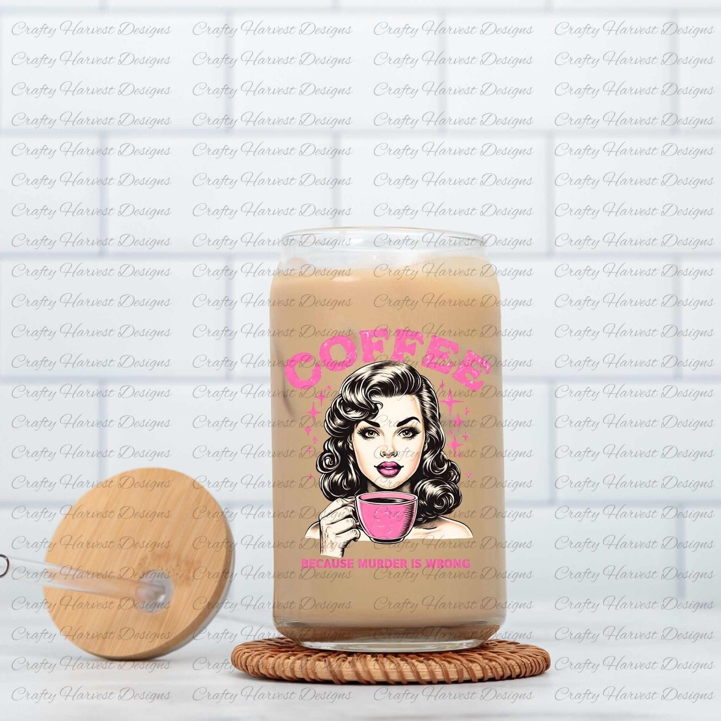 Clear glass can featuring a retro-inspired digital design of a vintage-style woman holding a coffee cup, with the humorous text ‘Coffee - Because Murder Is Wrong’ in bold pink letters. The glass can is displayed on a woven coaster alongside a wooden lid with a straw slot, showcasing its use as a trendy and functional beverage container.