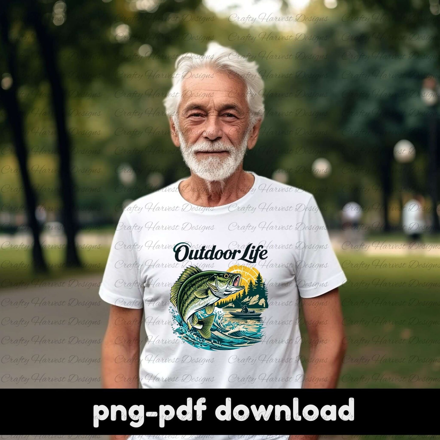 Older man standing in a park wearing a white t-shirt with a colorful design that reads “Outdoor Life” featuring a largemouth bass leaping from a lake with a sunset and forest background. The shirt is labeled as a PNG-PDF digital download.