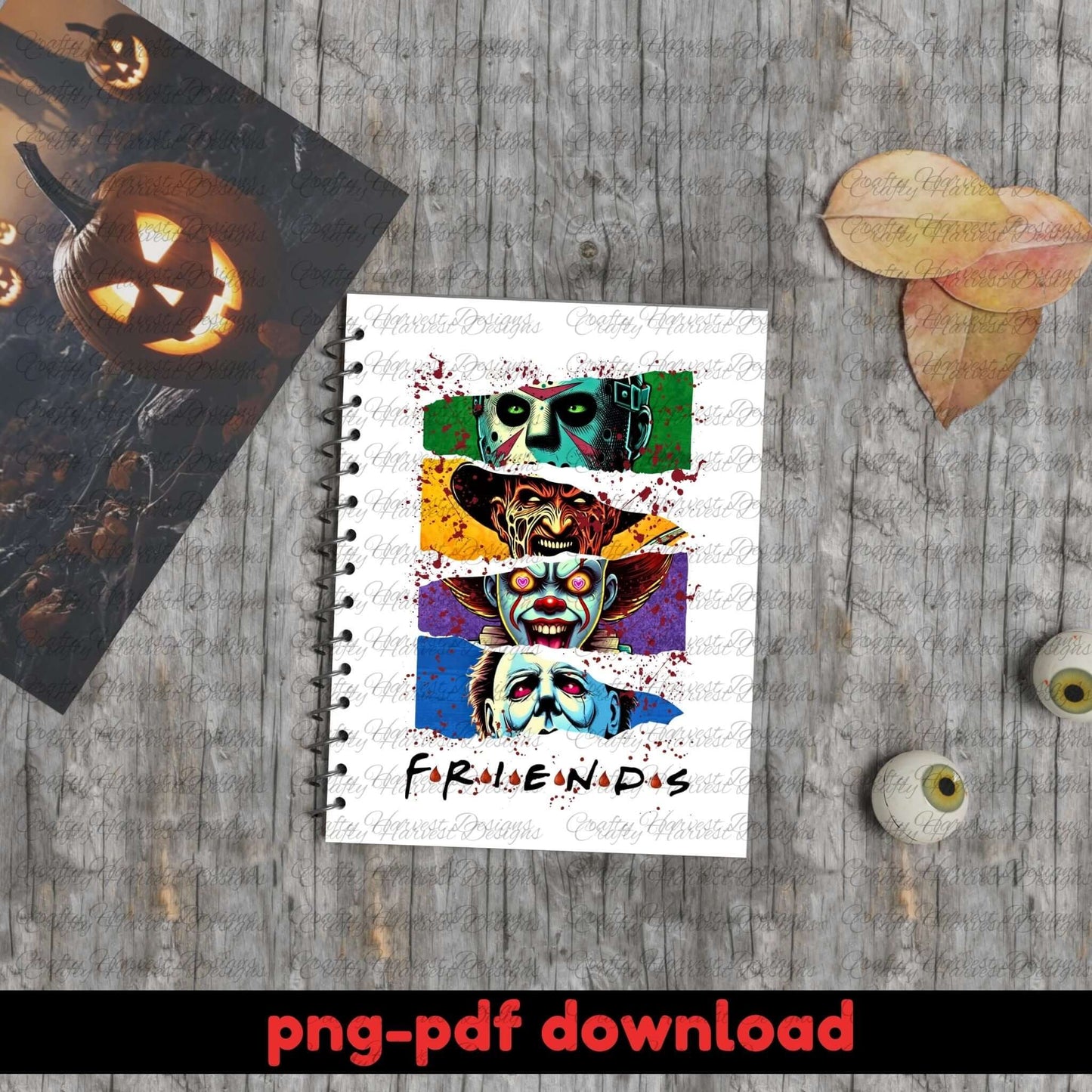 Notebook with colorful zombie faces design on a wooden surface with Halloween decorations.
