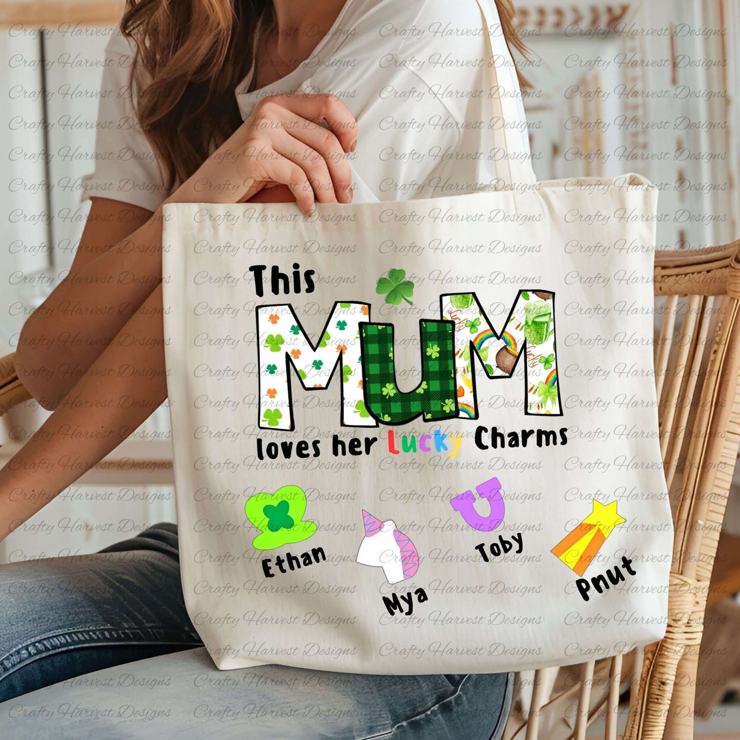 Tote bag with a “This MUM loves her Lucky Charms” design, featuring green-patterned letters and colorful charm icons with names below.