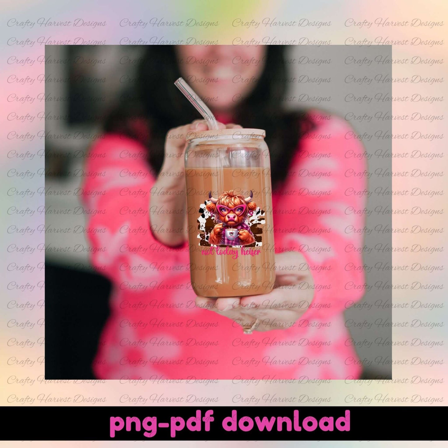 Person holding a mason jar with a design on a blurred background