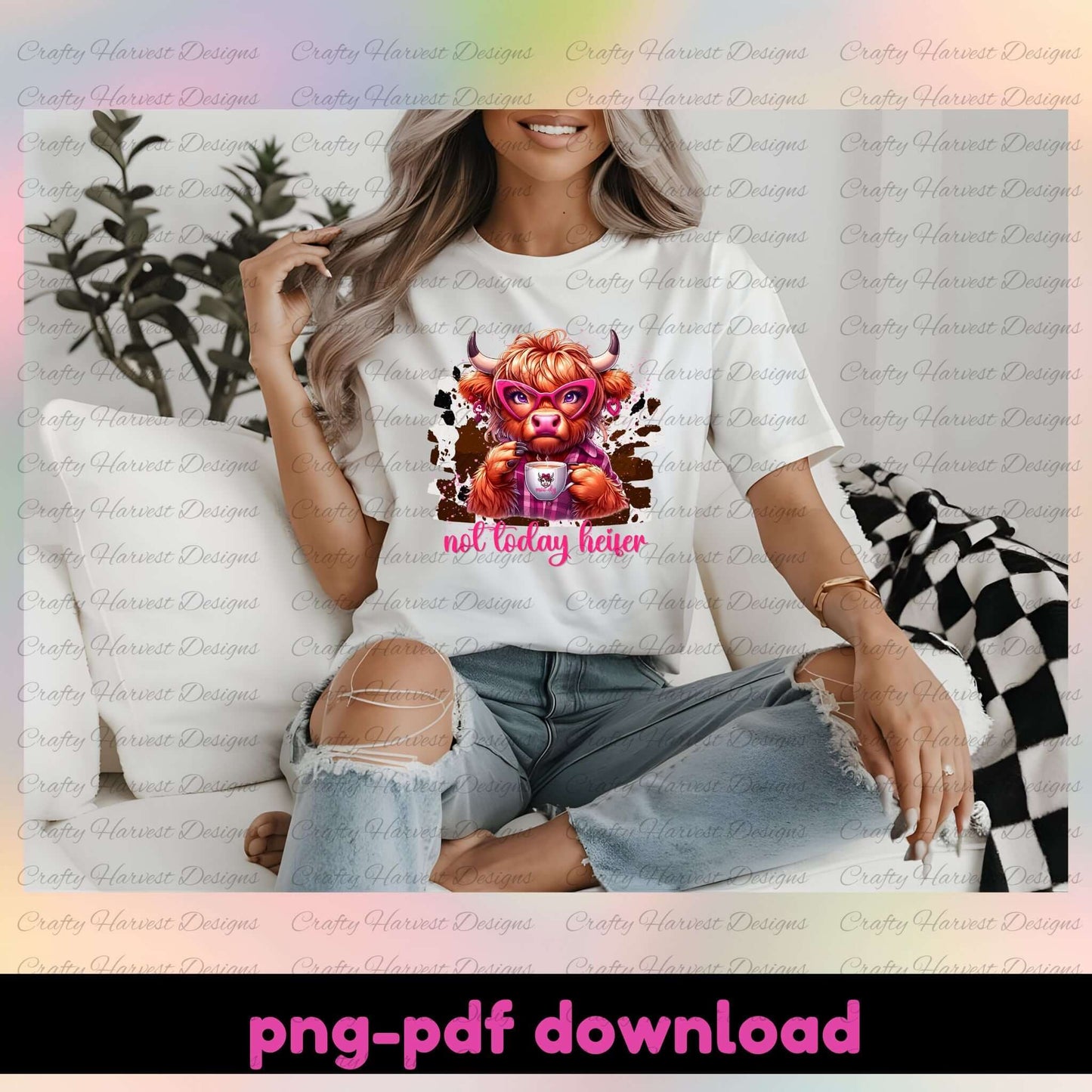 Woman wearing a white t-shirt with a graphic design sitting on a couch.