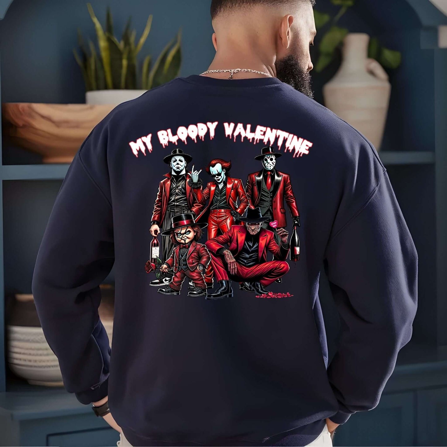 Back of a navy sweatshirt featuring a horror-themed Valentine’s Day design with characters in red suits and the text “My Bloody Valentine” in a dripping font.