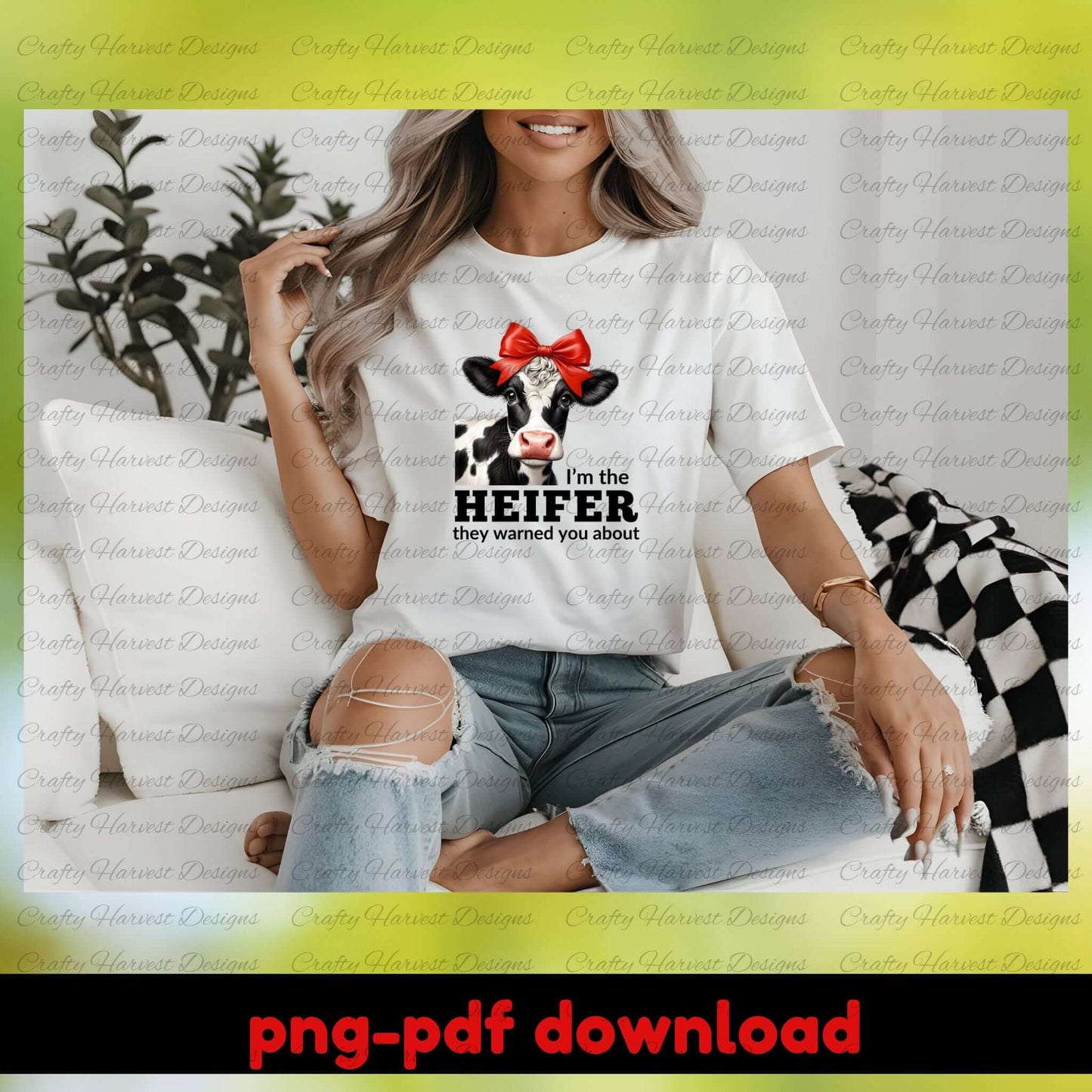 Person wearing a white t-shirt with a cow graphic and text, sitting on a couch.