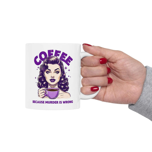 White ceramic mug featuring a retro ‘Coffee - Because Murder Is Wrong’ design in purple with a vintage-style woman holding a coffee cup illustration.