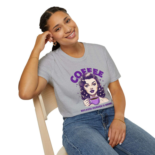 Woman wearing a Sport Grey unisex t-shirt featuring a retro ‘Coffee - Because Murder Is Wrong’ design in purple with a vintage-style illustration.