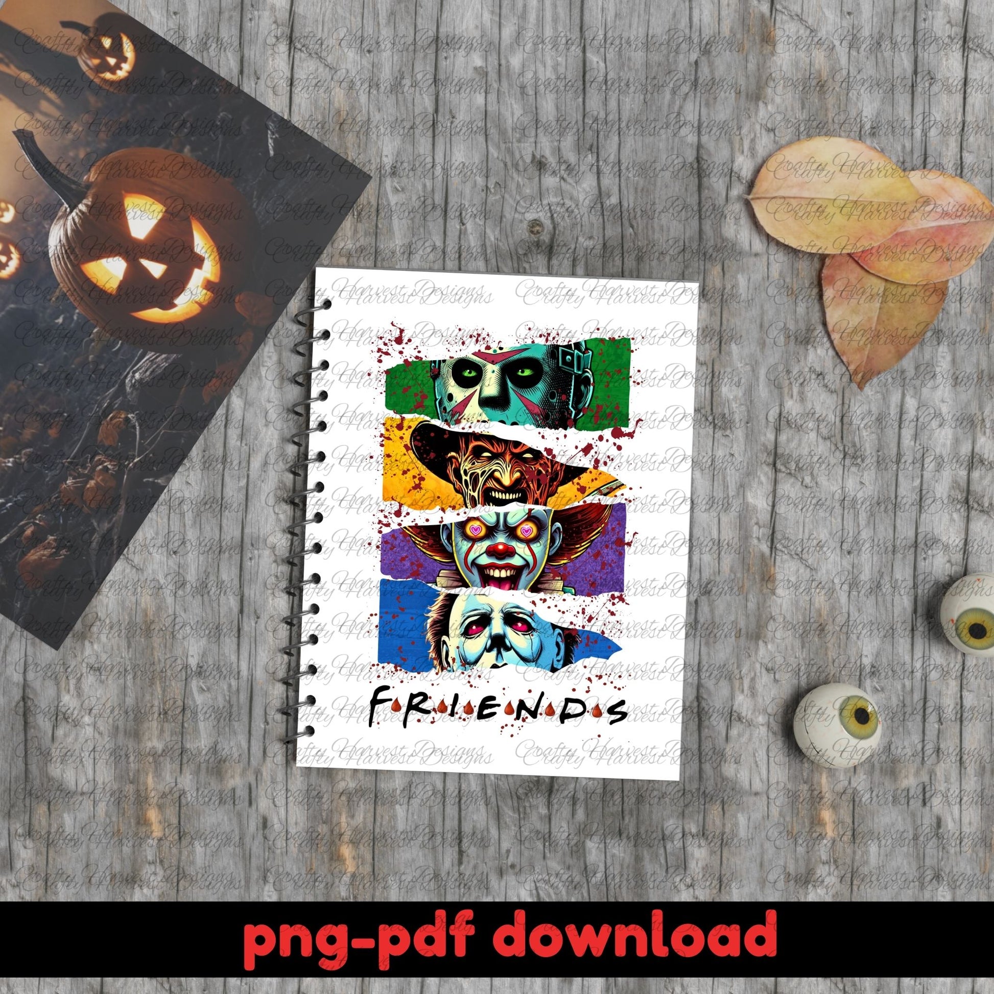 Notebook with colorful zombie faces design on a wooden surface with Halloween decorations.