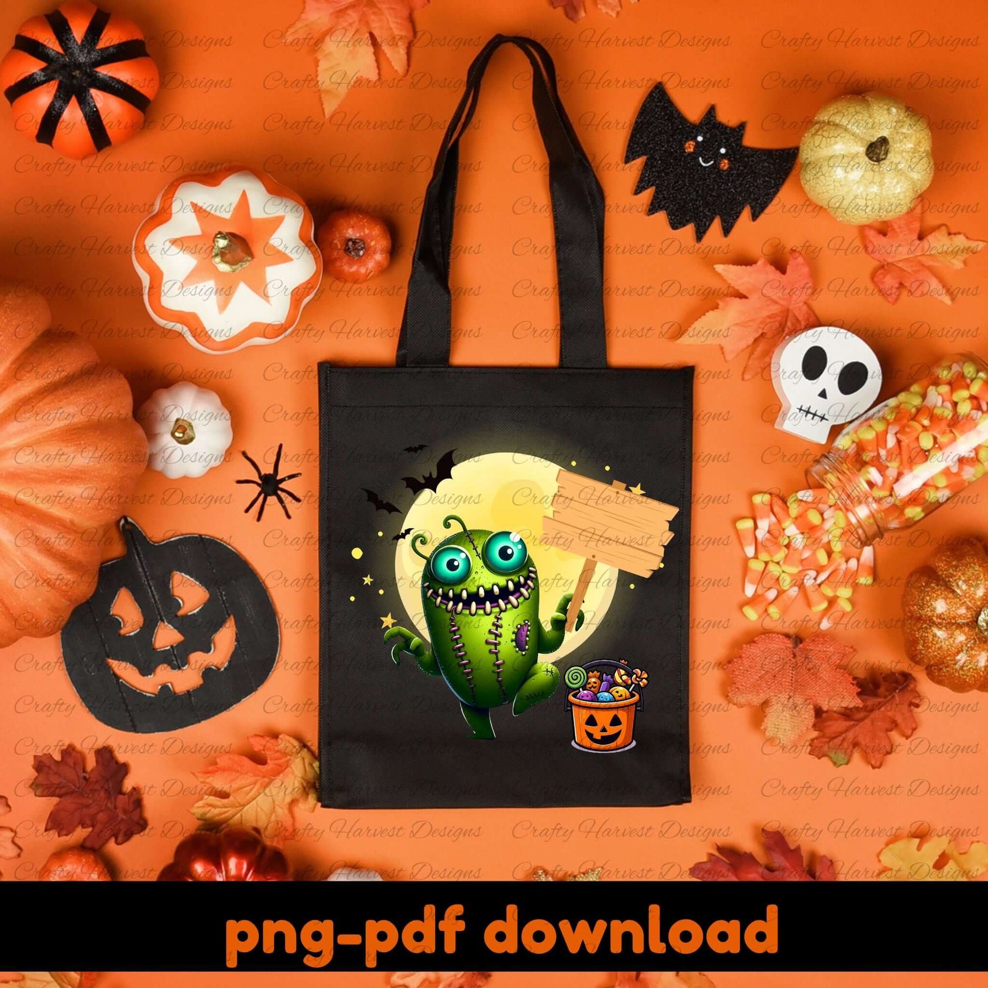 Black tote bag with Halloween design surrounded by pumpkins, cookies, and leaves on an orange background.