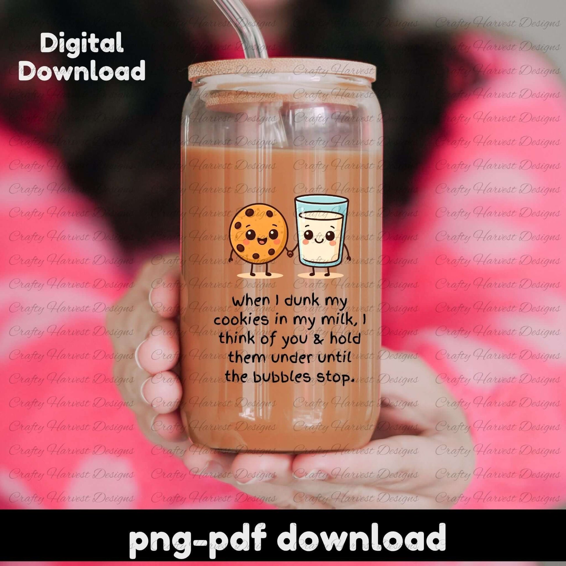 Mason jar with a cartoon cookie and cup design, held by a hand against a blurred background.