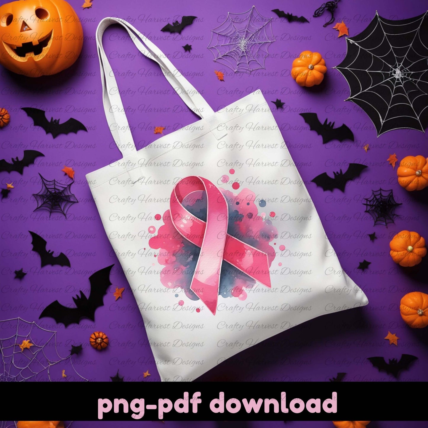 Tote bag with pink ribbon design on a Halloween-themed background with pumpkins, bats, and spider webs.