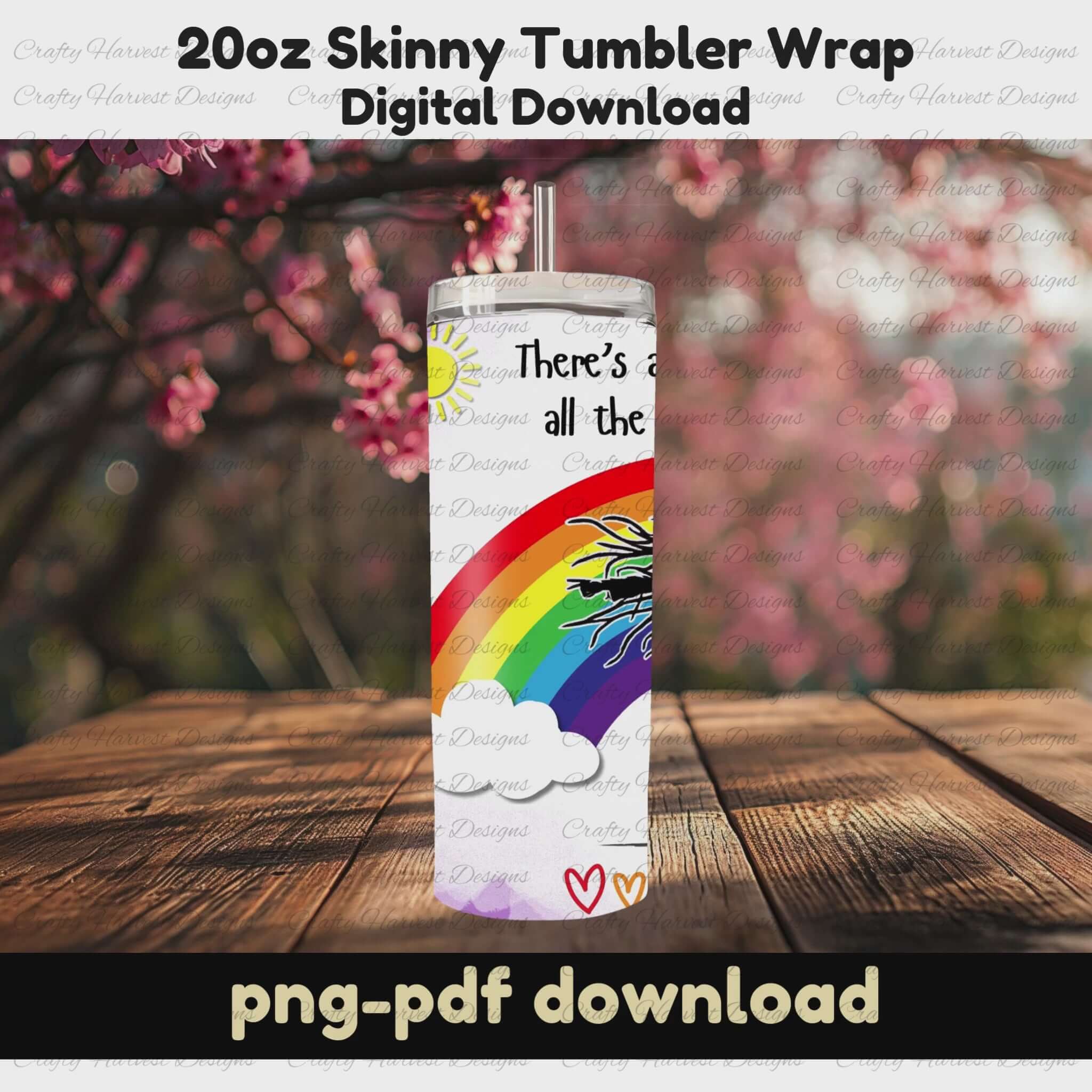 A rotating mockup of a 20oz skinny tumbler wrap featuring a rainbow, clouds, and a dancing silhouette with the quote “There’s a rainbow in the sky, all the time, don’t be blind.” in a mix of black and colorful text. The tumbler is displayed outdoors on a wooden surface with pink cherry blossoms in the background. Sublimation digital download.