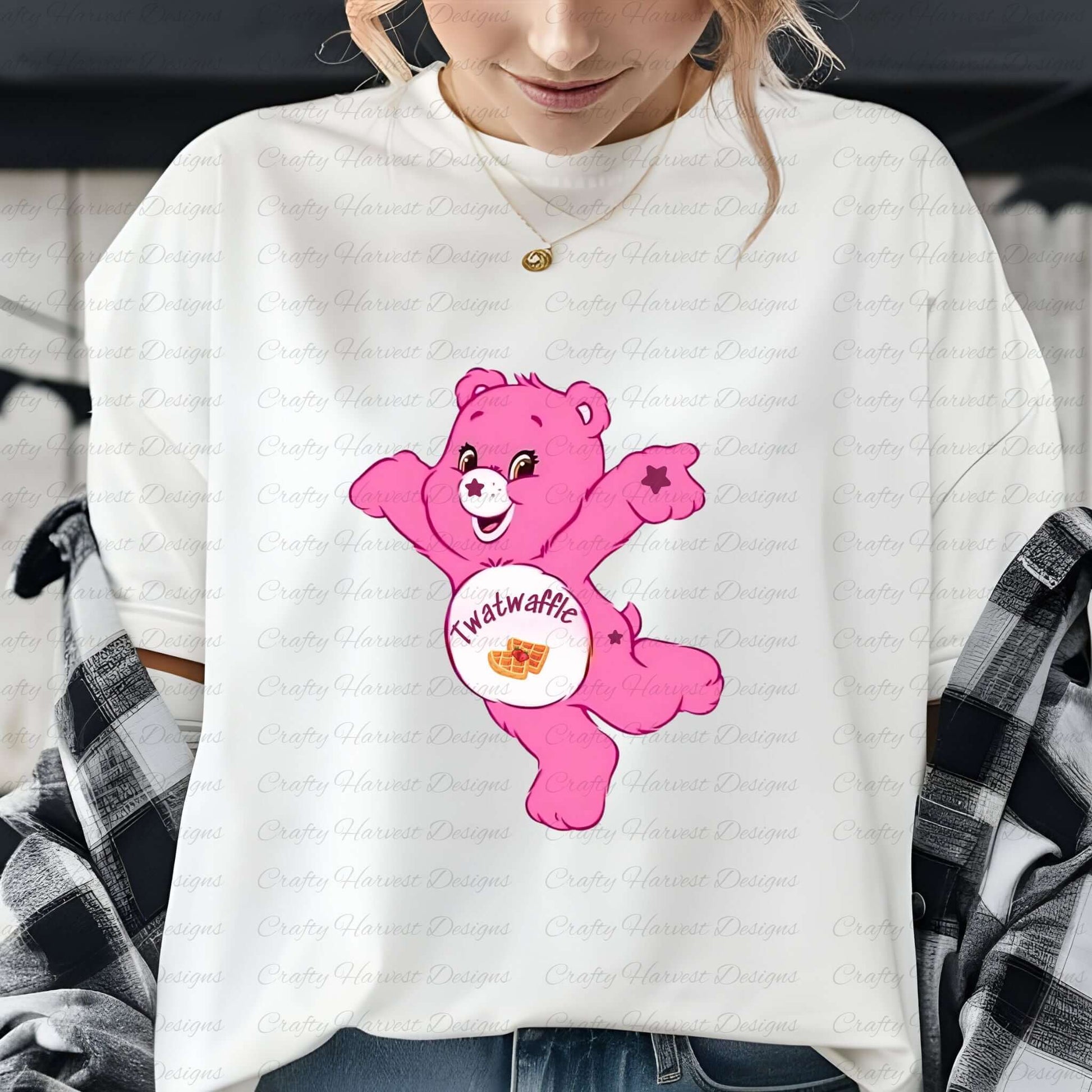 White t-shirt mockup featuring a pink Swear Bear design with the phrase “Twatwaffle” on the belly, styled with casual clothing and accessories.